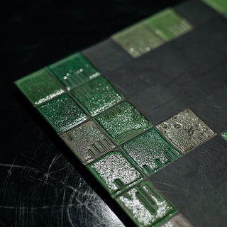 High-detail shot of custom Sandy Textured Spot UV Varnish on printed material, highlighting the unique granular texture and matte-gloss contrast.