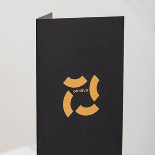 Corporate invitations printing featuring an orange screen printed logo on premium matte black cardstock.