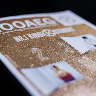 Custom glitter book cover design with a shimmering gold textured surface and numbered perforated windows.