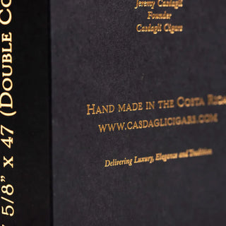 Cigars box featuring elegant gold foil embossed printing for the brand information and website.