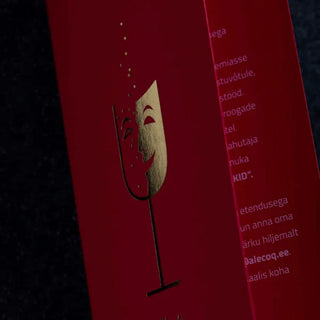 Custom gold foil invitation printing on premium red cardstock featuring a metallic gold theater mask and glass illustration.