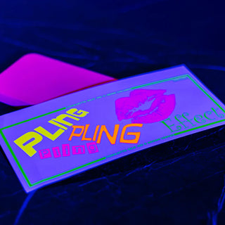 Custom neon screen printing on a "Pling Pling Effect" card showing vibrant pink and yellow ink under UV blacklight.