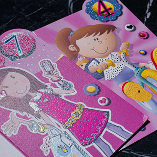 Pink children's book illustrations featuring a rose glitter screen print on a girl's dress and sparkling numbered decals.